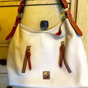 Dooney & Bourke cream colored shoulder bag In EXCELLENT condition.